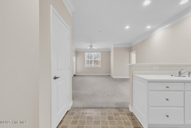 Welcome to this desirable first-floor condo located along the on Crow Creek Golf Club in North Carolina - for sale on GolfHomes.com, golf home, golf lot