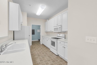 Welcome to this desirable first-floor condo located along the on Crow Creek Golf Club in North Carolina - for sale on GolfHomes.com, golf home, golf lot