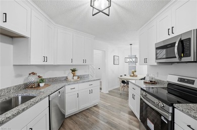 Stunning, move-in ready townhome with sweeping golf course views on Cypress Point Country Club in Virginia - for sale on GolfHomes.com, golf home, golf lot