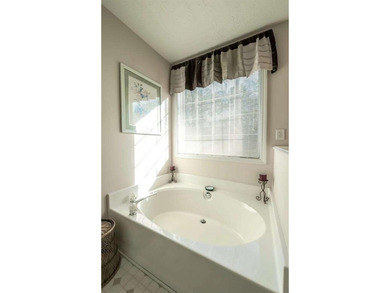 Welcome to this inviting 3-bedroom, 2-bath split-level home on Fairfield Plantation Golf and Country Club in Georgia - for sale on GolfHomes.com, golf home, golf lot