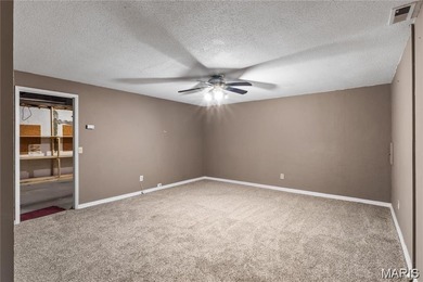 Live the lake life! This nicely updated 3 bedroom, 2.5 bathroom on Lake Saint Louis Par 3 in Missouri - for sale on GolfHomes.com, golf home, golf lot