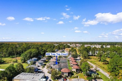 Nestled in the sought-after Island Green Tree Top community on Island Green Golf Club in South Carolina - for sale on GolfHomes.com, golf home, golf lot