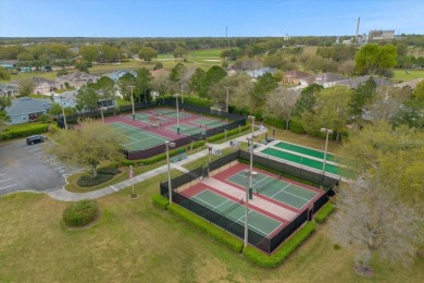 Nestled in the heart of Central Florida's Lake County, this on Arlington Ridge Golf Club in Florida - for sale on GolfHomes.com, golf home, golf lot