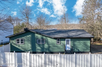 WATERFRONT DRIVE MODERN RENOVATED CONTEMPORARY RANCH Lake Views on Pocono Farms Country Club in Pennsylvania - for sale on GolfHomes.com, golf home, golf lot