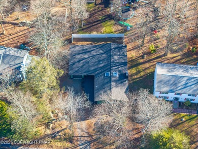 WATERFRONT DRIVE MODERN RENOVATED CONTEMPORARY RANCH Lake Views on Pocono Farms Country Club in Pennsylvania - for sale on GolfHomes.com, golf home, golf lot