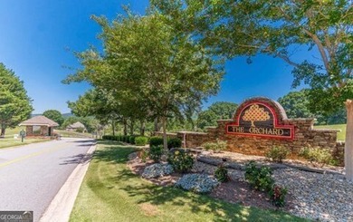 GOLF COURSE FRONTAGE - two adjacent lots totaling 1.69-/+ acres on The Orchard Golf and Country Club in Georgia - for sale on GolfHomes.com, golf home, golf lot