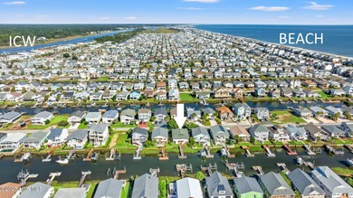 Charming Beach Cottage on Canal Lot with Boat Dock This is a on Sea Trail Golf Resort in North Carolina - for sale on GolfHomes.com, golf home, golf lot