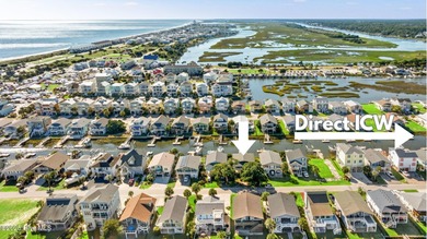 Charming Beach Cottage on Canal Lot with Boat Dock This is a on Sea Trail Golf Resort in North Carolina - for sale on GolfHomes.com, golf home, golf lot