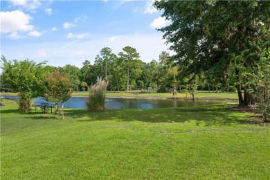 BRAND NEW ROOF INSTALLED DECEMBER 2024. Experience the elegance on Laurel Island Links in Georgia - for sale on GolfHomes.com, golf home, golf lot