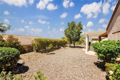 Immaculate Lincoln model with paver driveway, large courtyard on Revere Golf Club in Nevada - for sale on GolfHomes.com, golf home, golf lot