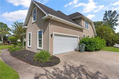 BRAND NEW ROOF INSTALLED DECEMBER 2024. Experience the elegance on Laurel Island Links in Georgia - for sale on GolfHomes.com, golf home, golf lot