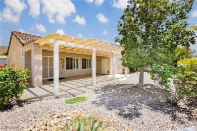 Immaculate Lincoln model with paver driveway, large courtyard on Revere Golf Club in Nevada - for sale on GolfHomes.com, golf home, golf lot