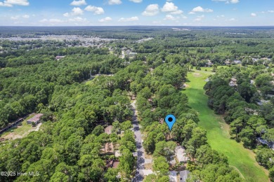 Located in an established and desirable neighborhood of Carolina on Carolina Shores Golf Course in North Carolina - for sale on GolfHomes.com, golf home, golf lot