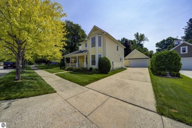 Tucked within the highly sought-after Harborage Park community on Ye Nyne Olde Holles Golf Club in Michigan - for sale on GolfHomes.com, golf home, golf lot
