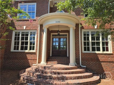 Timeless elegance in The Georgia Club! Welcome to this stately on The Georgia Club in Georgia - for sale on GolfHomes.com, golf home, golf lot