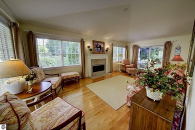 Tucked within the highly sought-after Harborage Park community on Ye Nyne Olde Holles Golf Club in Michigan - for sale on GolfHomes.com, golf home, golf lot