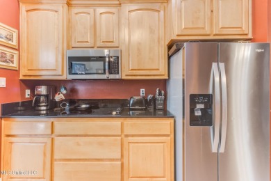 This house comes with a REDUCED RATE as low as 5.5% (APR 5 on Diamondhead Country Club in Mississippi - for sale on GolfHomes.com, golf home, golf lot