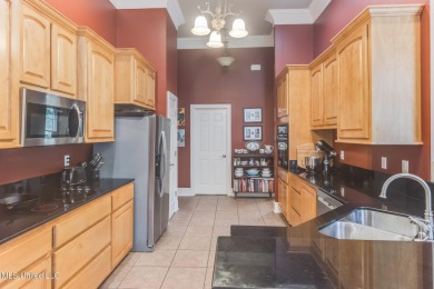 This house comes with a REDUCED RATE as low as 5.5% (APR 5 on Diamondhead Country Club in Mississippi - for sale on GolfHomes.com, golf home, golf lot