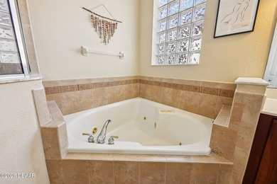 Experience the Florida lifestyle in the gated community of The on Glen Abbey Golf Club in Florida - for sale on GolfHomes.com, golf home, golf lot