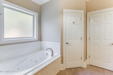 This house comes with a REDUCED RATE as low as 5.5% (APR 5 on Diamondhead Country Club in Mississippi - for sale on GolfHomes.com, golf home, golf lot