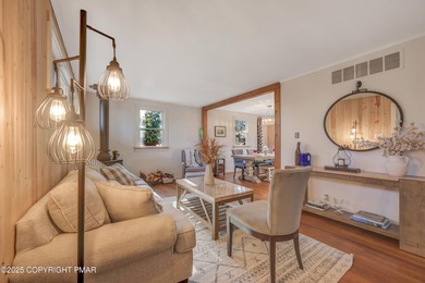 This charming three-bedroom, two-and-a-half-bathroom cottage on Buck Hill Golf Club  in Pennsylvania - for sale on GolfHomes.com, golf home, golf lot