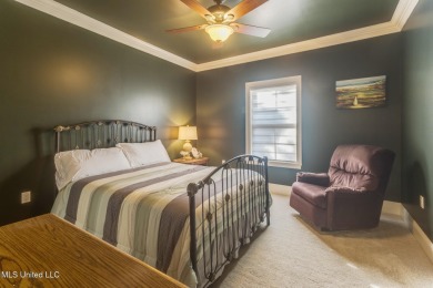 This house comes with a REDUCED RATE as low as 5.5% (APR 5 on Diamondhead Country Club in Mississippi - for sale on GolfHomes.com, golf home, golf lot