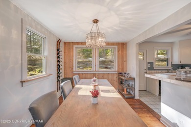 This charming three-bedroom, two-and-a-half-bathroom cottage on Buck Hill Golf Club  in Pennsylvania - for sale on GolfHomes.com, golf home, golf lot