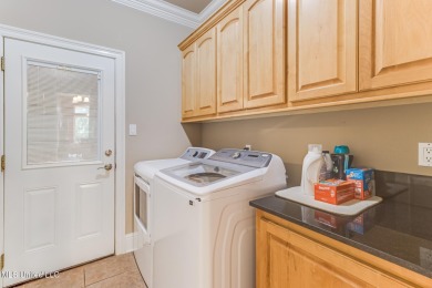 This house comes with a REDUCED RATE as low as 5.5% (APR 5 on Diamondhead Country Club in Mississippi - for sale on GolfHomes.com, golf home, golf lot