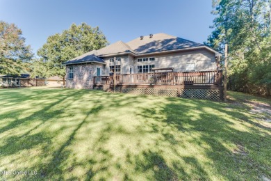 This house comes with a REDUCED RATE as low as 5.5% (APR 5 on Diamondhead Country Club in Mississippi - for sale on GolfHomes.com, golf home, golf lot