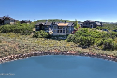 Perched above the second tee of the Outlaw golf course with on Talisker Club At Tuhaye in Utah - for sale on GolfHomes.com, golf home, golf lot