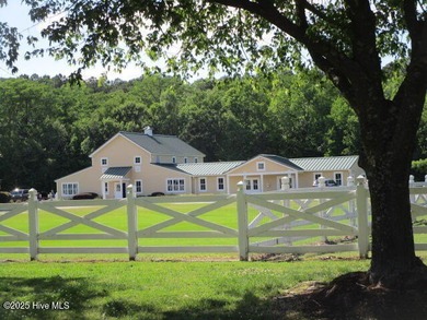 This .44 acre lot located on the golf course with trees in on Sound Golf Links at Albemarle Plantation in North Carolina - for sale on GolfHomes.com, golf home, golf lot