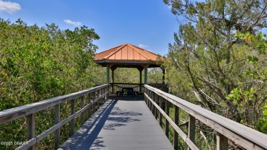 Nestled in the heart of Ponce Inlet, this luxurious condo on Harbour Village Golf and Yacht Club in Florida - for sale on GolfHomes.com, golf home, golf lot