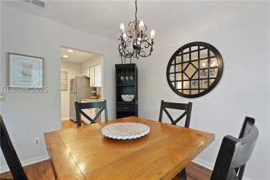 Updated and fully furnished top-floor corner unit in Lighthouse on Harbour Town Golf Links in South Carolina - for sale on GolfHomes.com, golf home, golf lot
