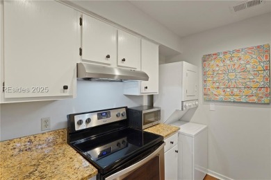 Updated and fully furnished top-floor corner unit in Lighthouse on Harbour Town Golf Links in South Carolina - for sale on GolfHomes.com, golf home, golf lot