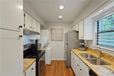 Updated and fully furnished top-floor corner unit in Lighthouse on Harbour Town Golf Links in South Carolina - for sale on GolfHomes.com, golf home, golf lot