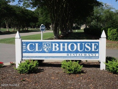 This .44 acre lot located on the golf course with trees in on Sound Golf Links at Albemarle Plantation in North Carolina - for sale on GolfHomes.com, golf home, golf lot