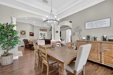 Welcome to this stunning and meticulously maintained home in one on Harbor Hills Country Club in Florida - for sale on GolfHomes.com, golf home, golf lot