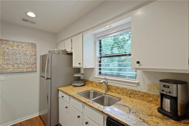 Updated and fully furnished top-floor corner unit in Lighthouse on Harbour Town Golf Links in South Carolina - for sale on GolfHomes.com, golf home, golf lot