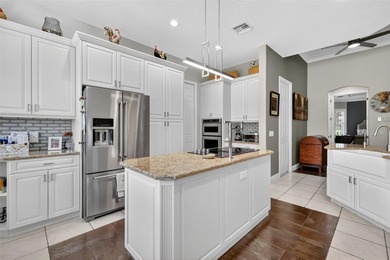 Welcome to this stunning and meticulously maintained home in one on Harbor Hills Country Club in Florida - for sale on GolfHomes.com, golf home, golf lot