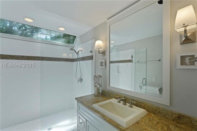 Updated and fully furnished top-floor corner unit in Lighthouse on Harbour Town Golf Links in South Carolina - for sale on GolfHomes.com, golf home, golf lot