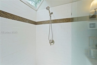 Updated and fully furnished top-floor corner unit in Lighthouse on Harbour Town Golf Links in South Carolina - for sale on GolfHomes.com, golf home, golf lot