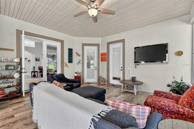 Welcome to this stunning and meticulously maintained home in one on Harbor Hills Country Club in Florida - for sale on GolfHomes.com, golf home, golf lot