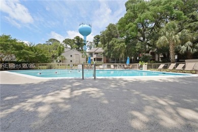 Updated and fully furnished top-floor corner unit in Lighthouse on Harbour Town Golf Links in South Carolina - for sale on GolfHomes.com, golf home, golf lot