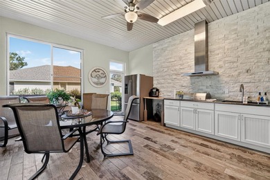 Welcome to this stunning and meticulously maintained home in one on Harbor Hills Country Club in Florida - for sale on GolfHomes.com, golf home, golf lot