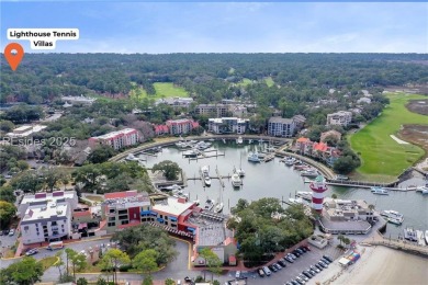 Updated and fully furnished top-floor corner unit in Lighthouse on Harbour Town Golf Links in South Carolina - for sale on GolfHomes.com, golf home, golf lot