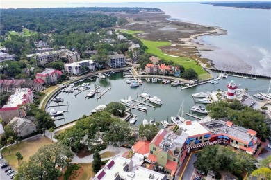 Updated and fully furnished top-floor corner unit in Lighthouse on Harbour Town Golf Links in South Carolina - for sale on GolfHomes.com, golf home, golf lot