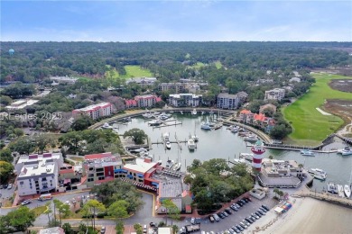 Updated and fully furnished top-floor corner unit in Lighthouse on Harbour Town Golf Links in South Carolina - for sale on GolfHomes.com, golf home, golf lot