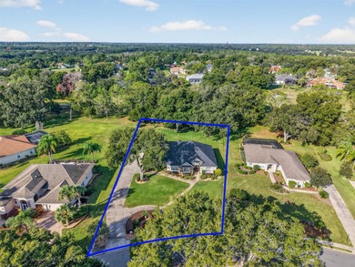 Welcome to this stunning and meticulously maintained home in one on Harbor Hills Country Club in Florida - for sale on GolfHomes.com, golf home, golf lot