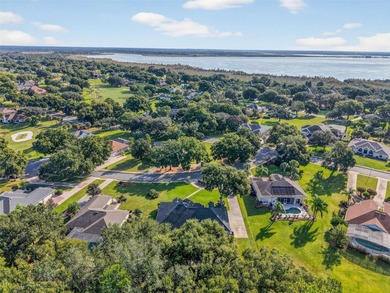 Welcome to this stunning and meticulously maintained home in one on Harbor Hills Country Club in Florida - for sale on GolfHomes.com, golf home, golf lot