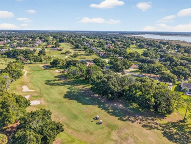 Welcome to this stunning and meticulously maintained home in one on Harbor Hills Country Club in Florida - for sale on GolfHomes.com, golf home, golf lot